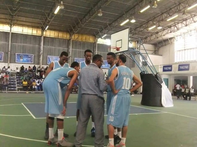 Barajab coaching the men's national team in Rwanda. 2013